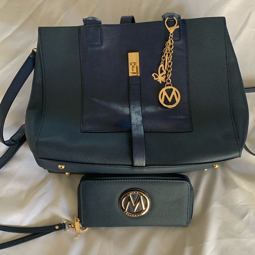 Navy blue MKF Collection Yola purse and matching wallet.